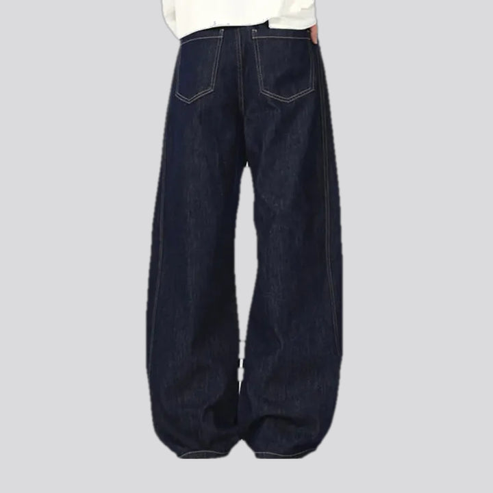 Slouchy 90s style dark men's jeans