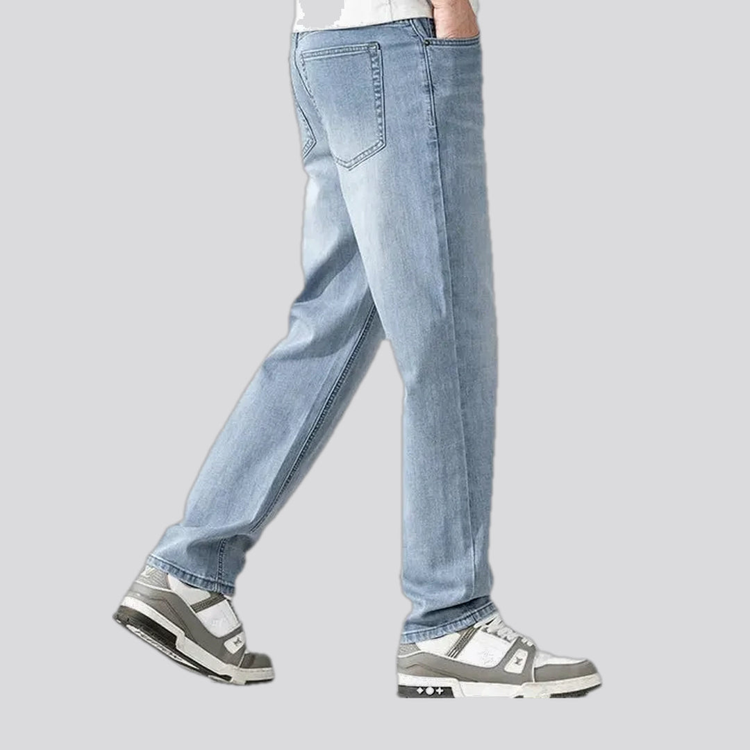 Mid rise light sanded men's jeans