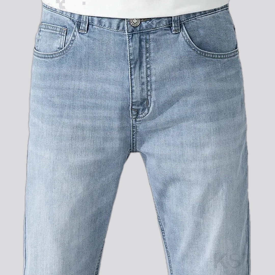Mid rise light sanded men's jeans